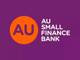 AU Small Finance Bank office building with leadership appointment announcement banner